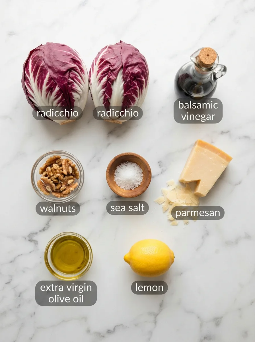 Ingredients for a radicchio recipe including radicchio heads, balsamic vinegar, parmesan, and walnuts
